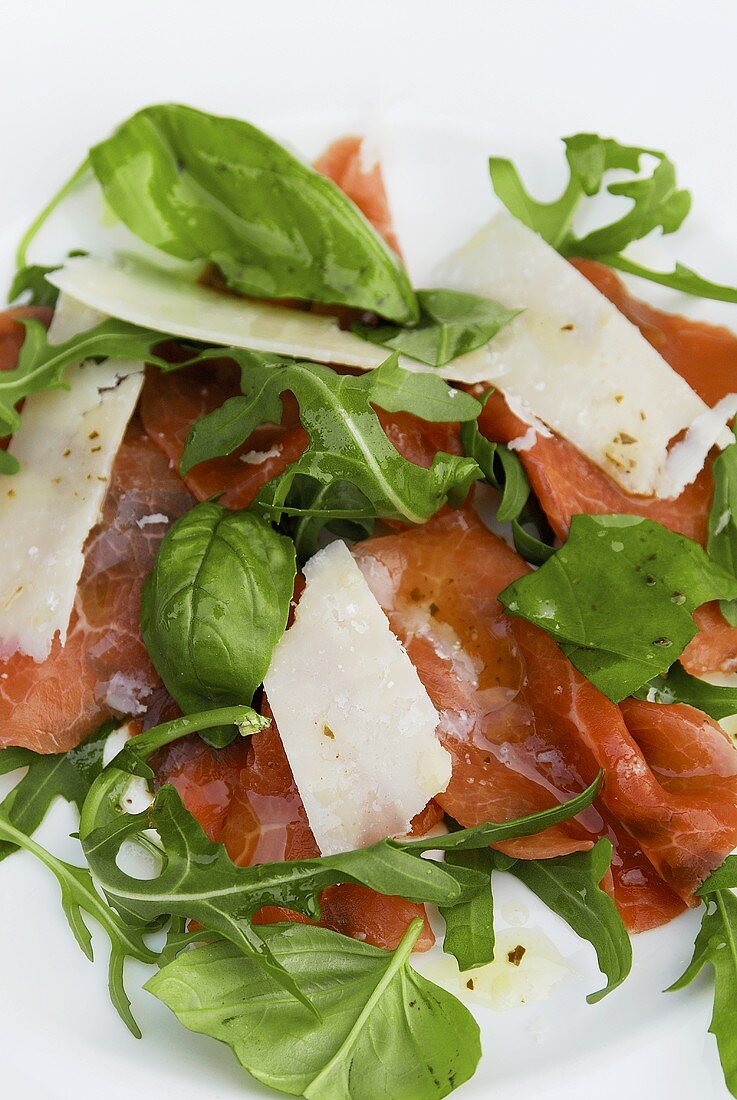 Beef carpaccio with rocket, basil and Parmesan