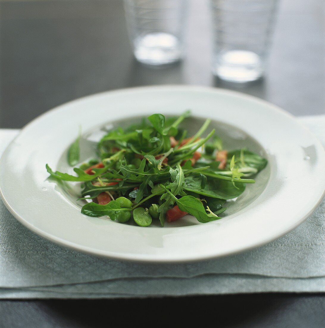 Mixed green salad leaves with diced bacon