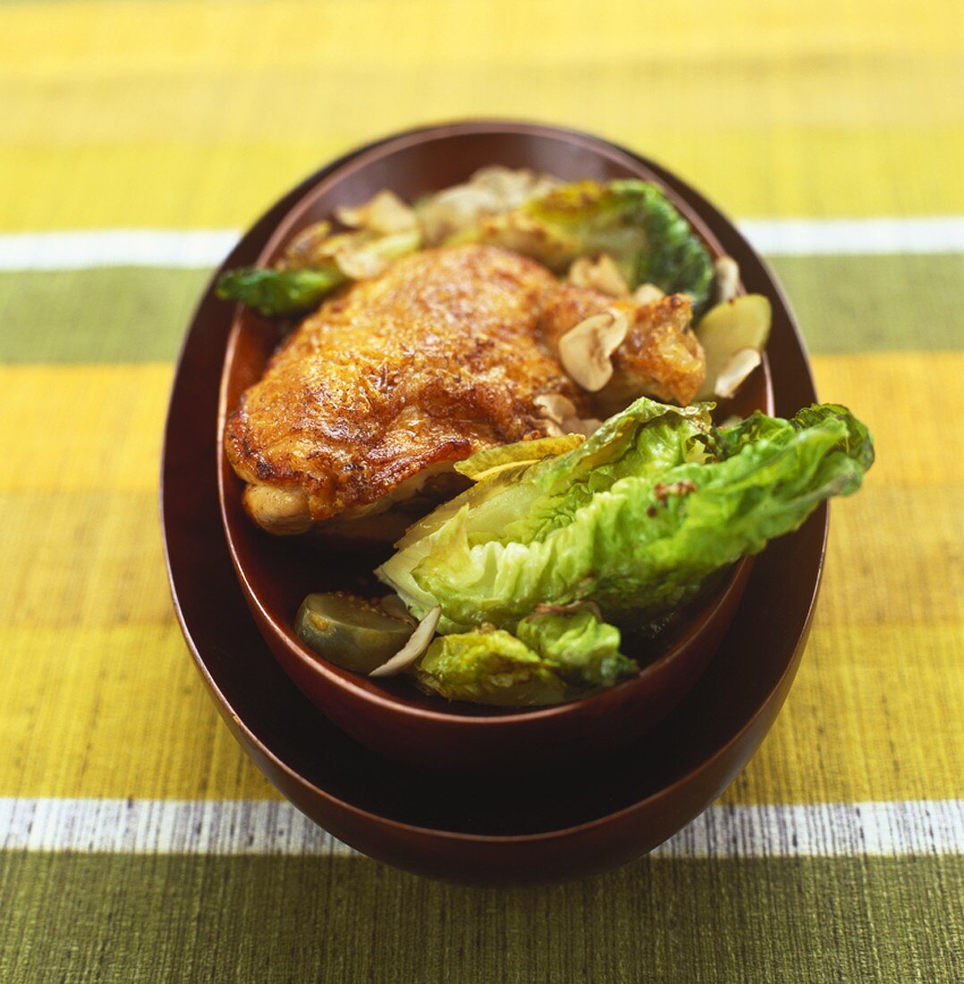 Whole chicken breast with lettuce and mushrooms