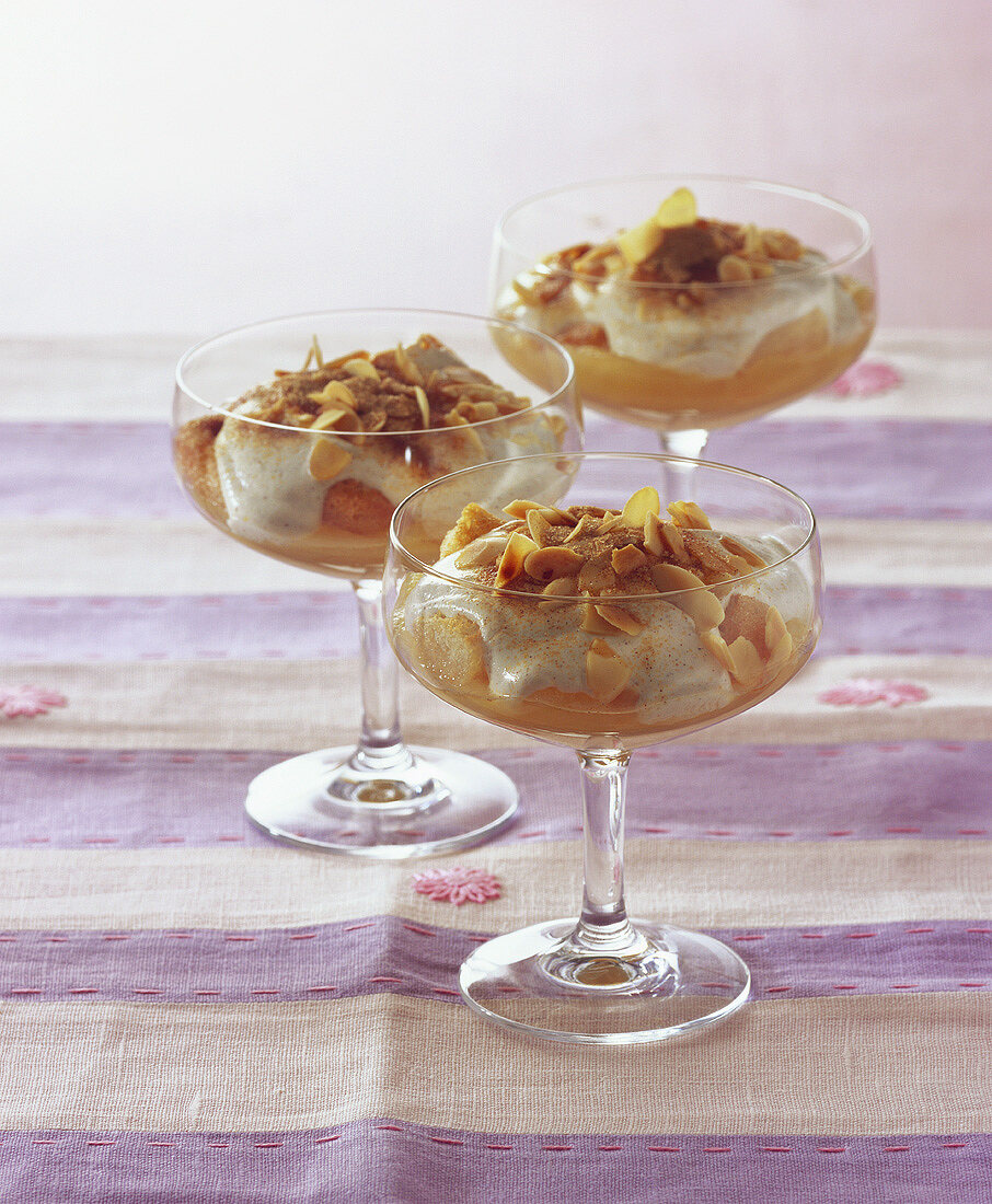 Apple and cinnamon tiramisu in stemmed dessert glasses