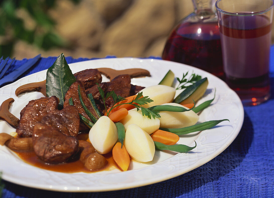 Braised beef (bull) with vegetables