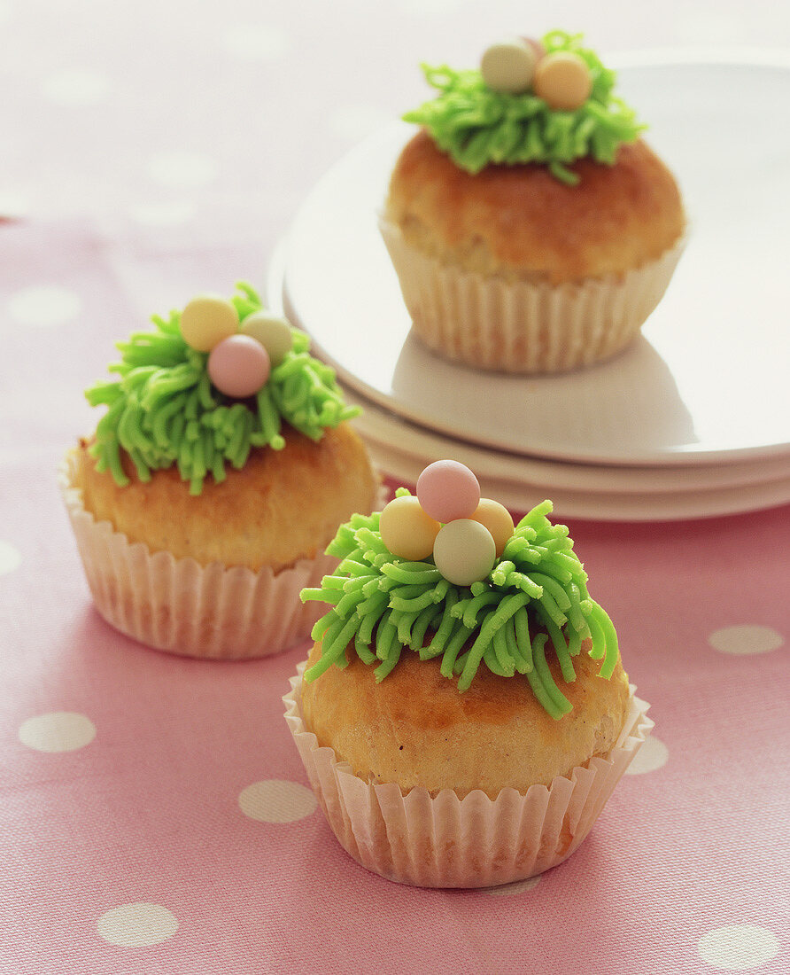 Easter muffins decorated with marzipan grass & sugar eggs