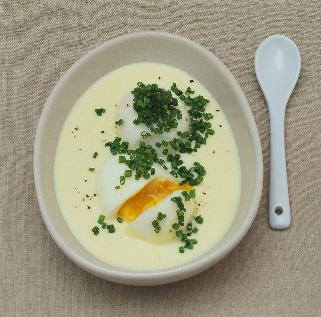 Soft-boiled eggs in herb and mustard sauce