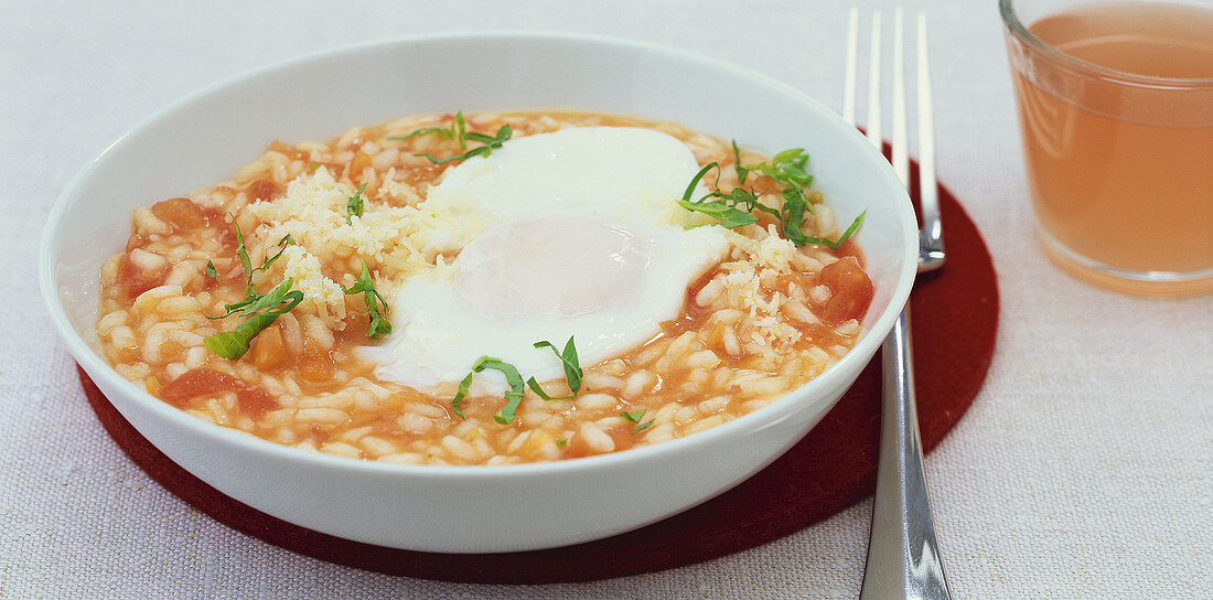 Tomato risotto with poached egg