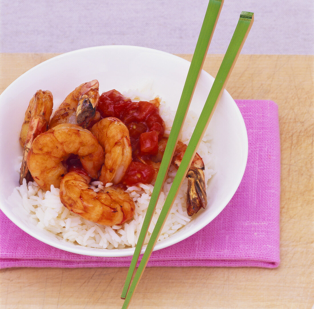 Sweet and sour ginger prawns on rice