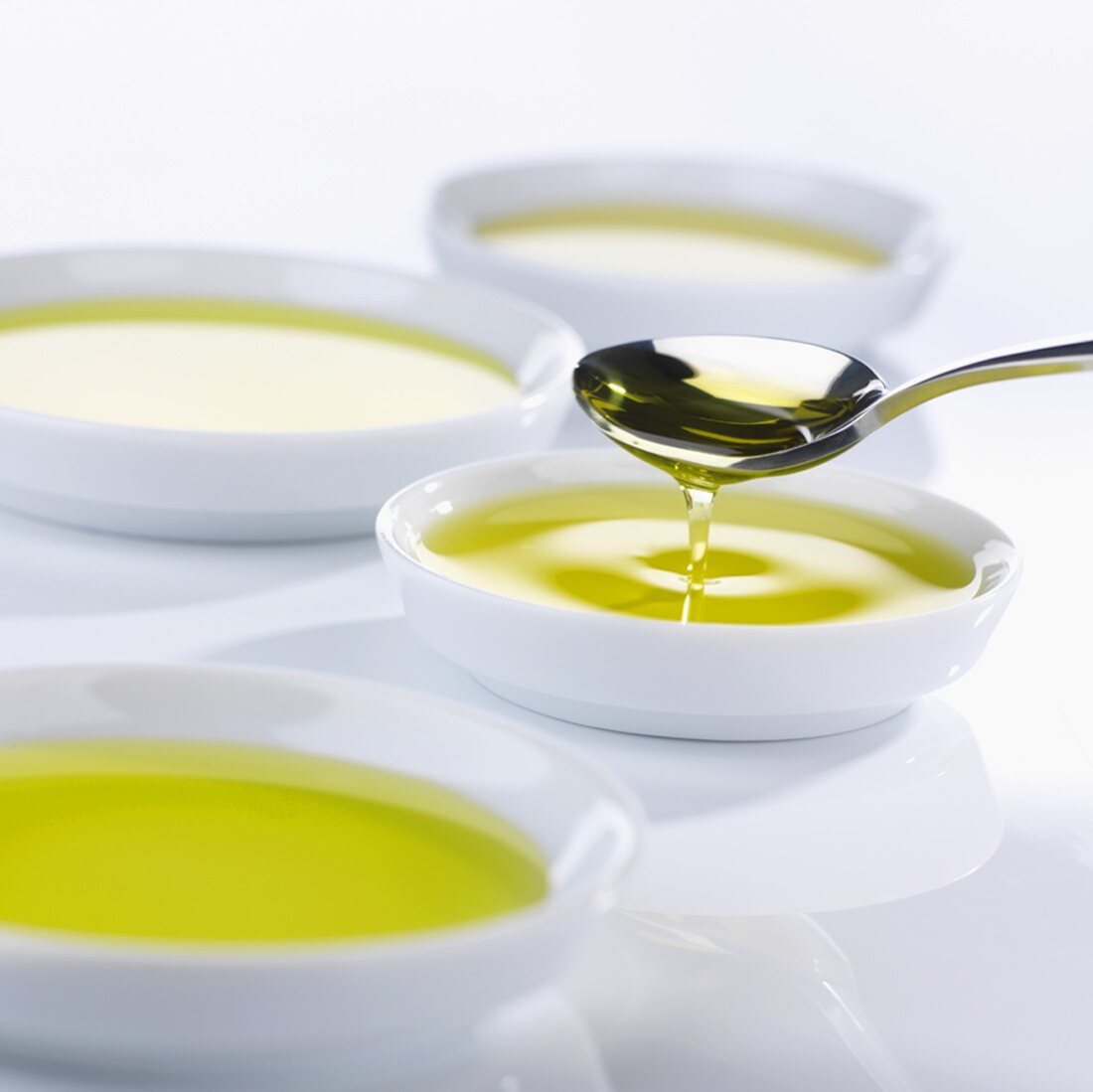 Tasting bowls full of olive oil