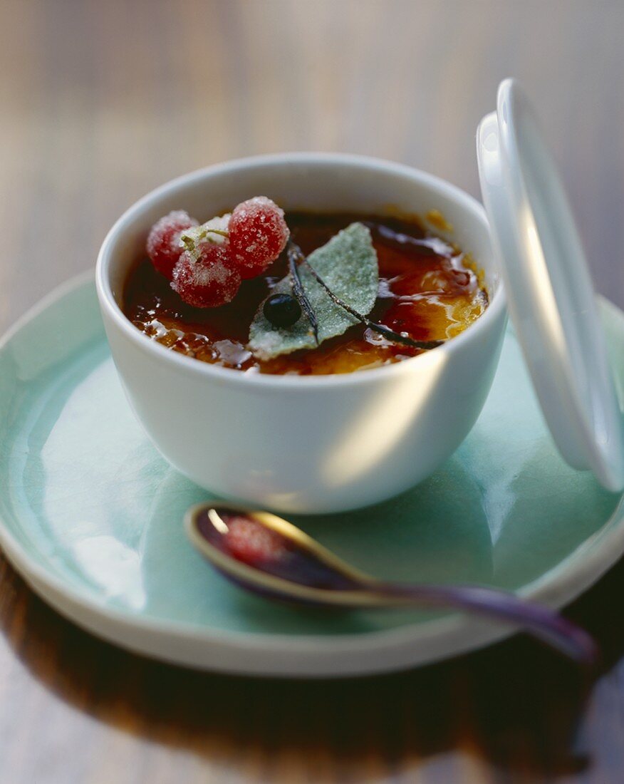 Crème brûlée with rosemary in small bowl