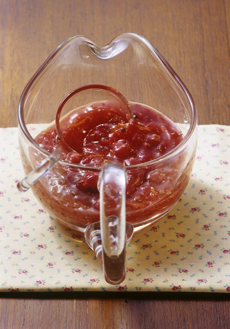 Cumberland sauce in a glass sauce-boat