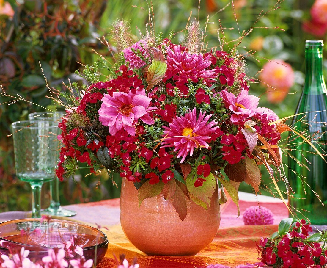 Vase of dahlias, sweet williams, switchgrass & Michaelmas daisies