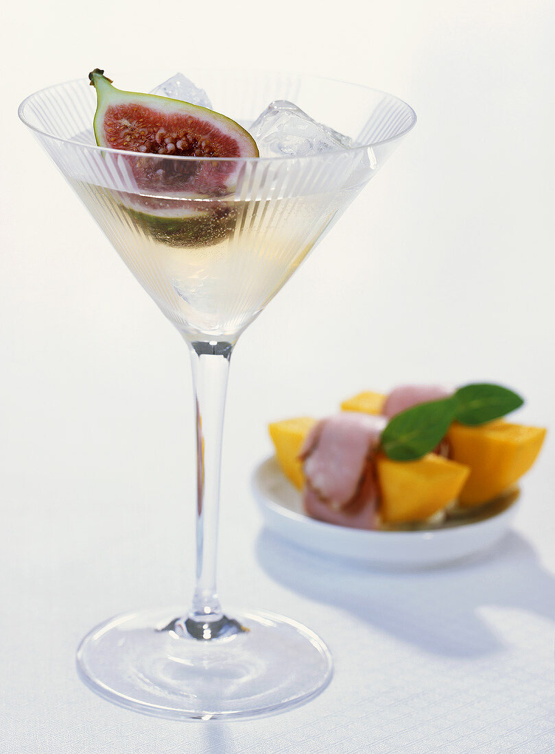 Sparkling wine cocktail with fig