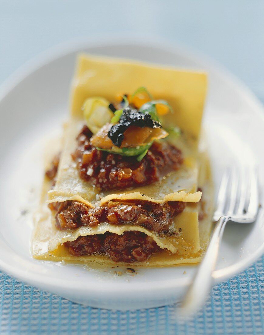 Open venison lasagne with Brussels sprouts & black chanterelles