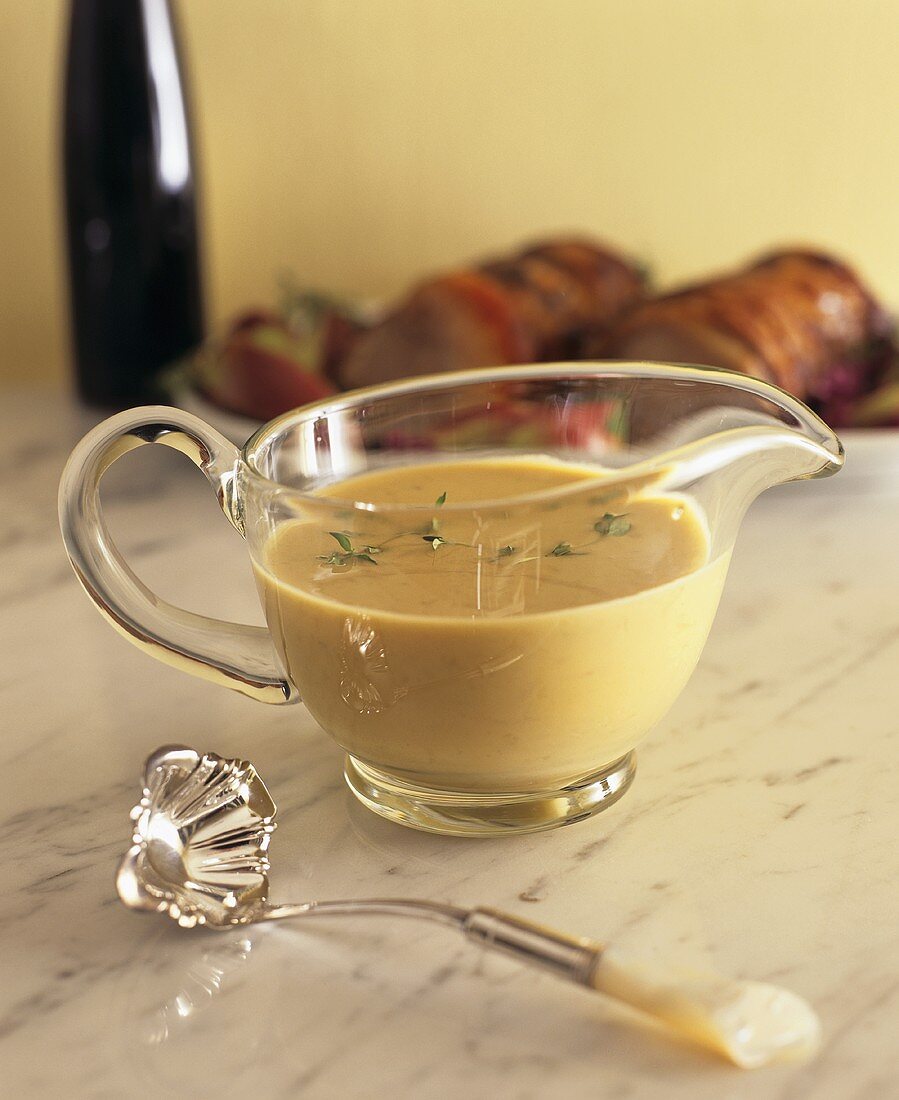 White sauce in glass sauce-boat