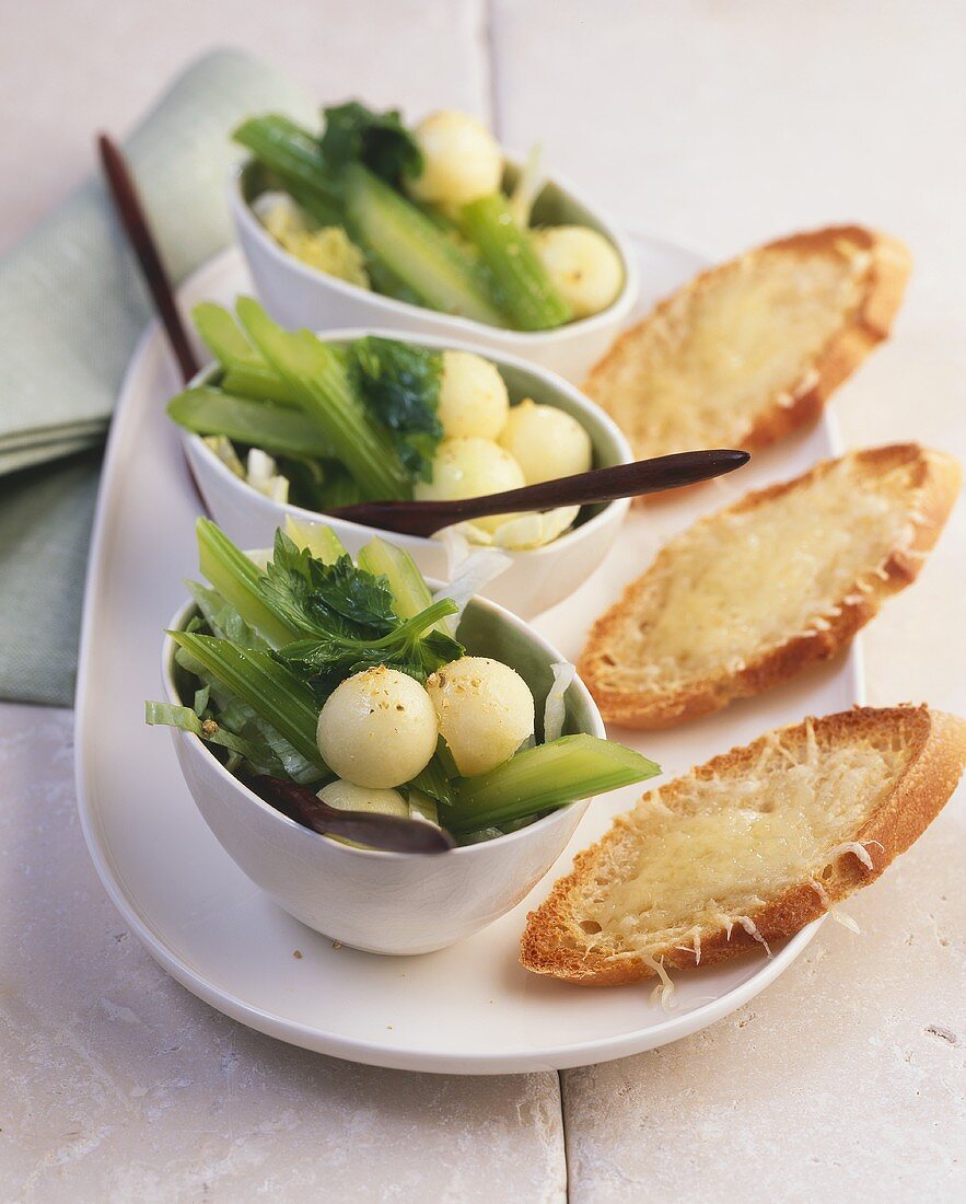 Salad leaves with celery and melon balls