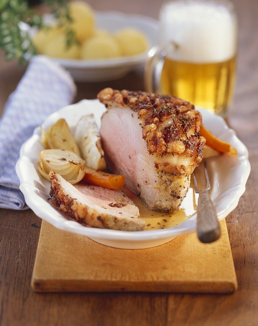 A succulent joint of roast pork with crackling