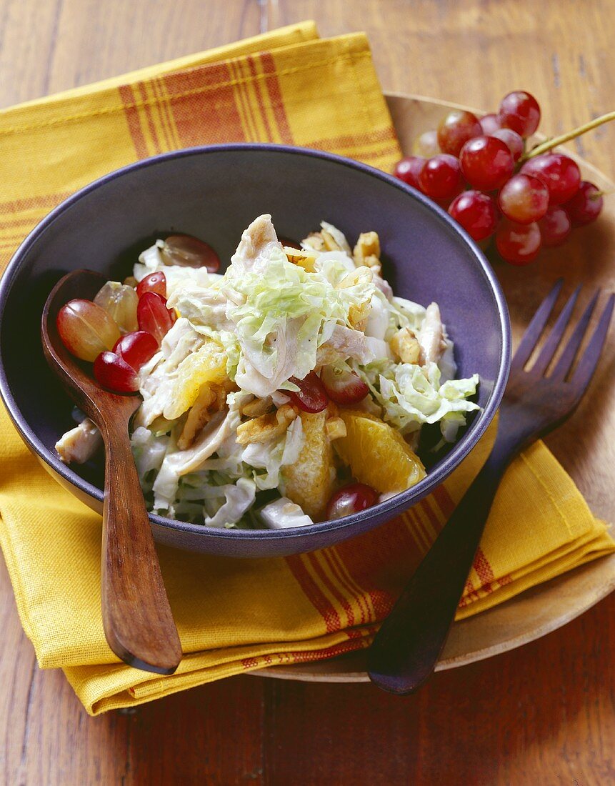 Chinese cabbage salad with poultry meat and grapes