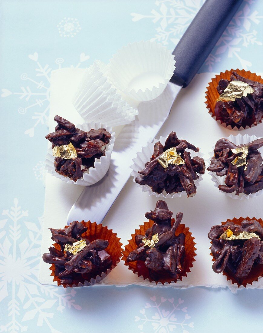 Dried fruit chocolates with gold leaf