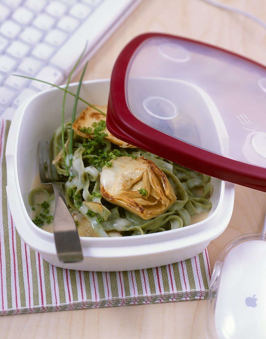 Tagliatelle in white wine and artichoke sauce