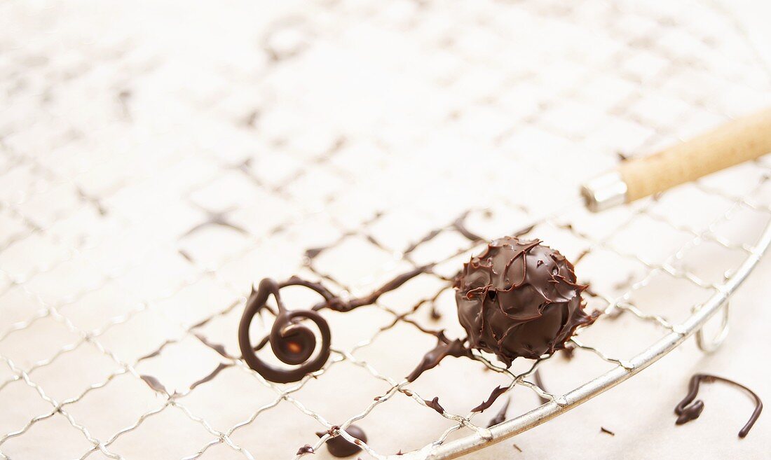 Chocolate truffle on cake rack
