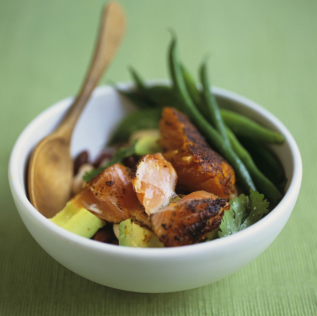 Fried salmon with avocado and green beans