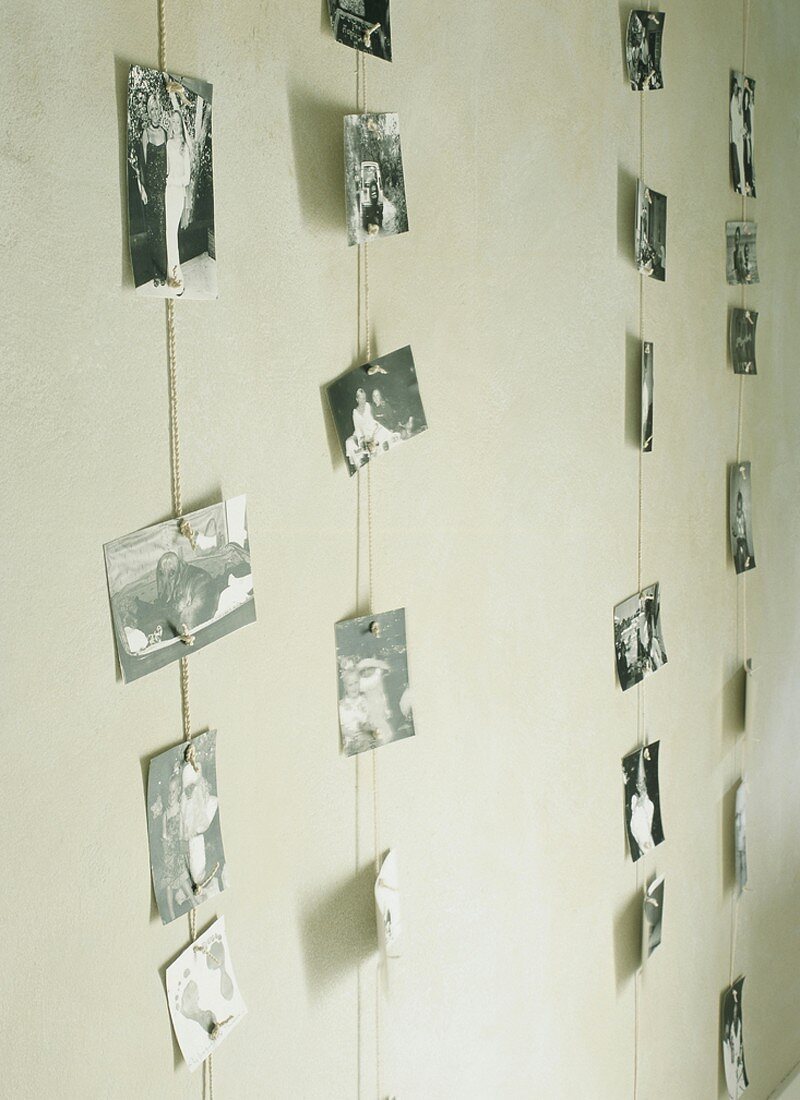 Pictures hanging on cord