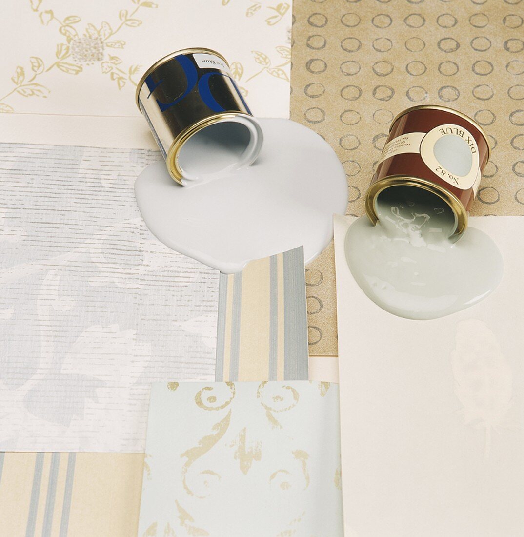 Wallpaper samples with spilt paint tins