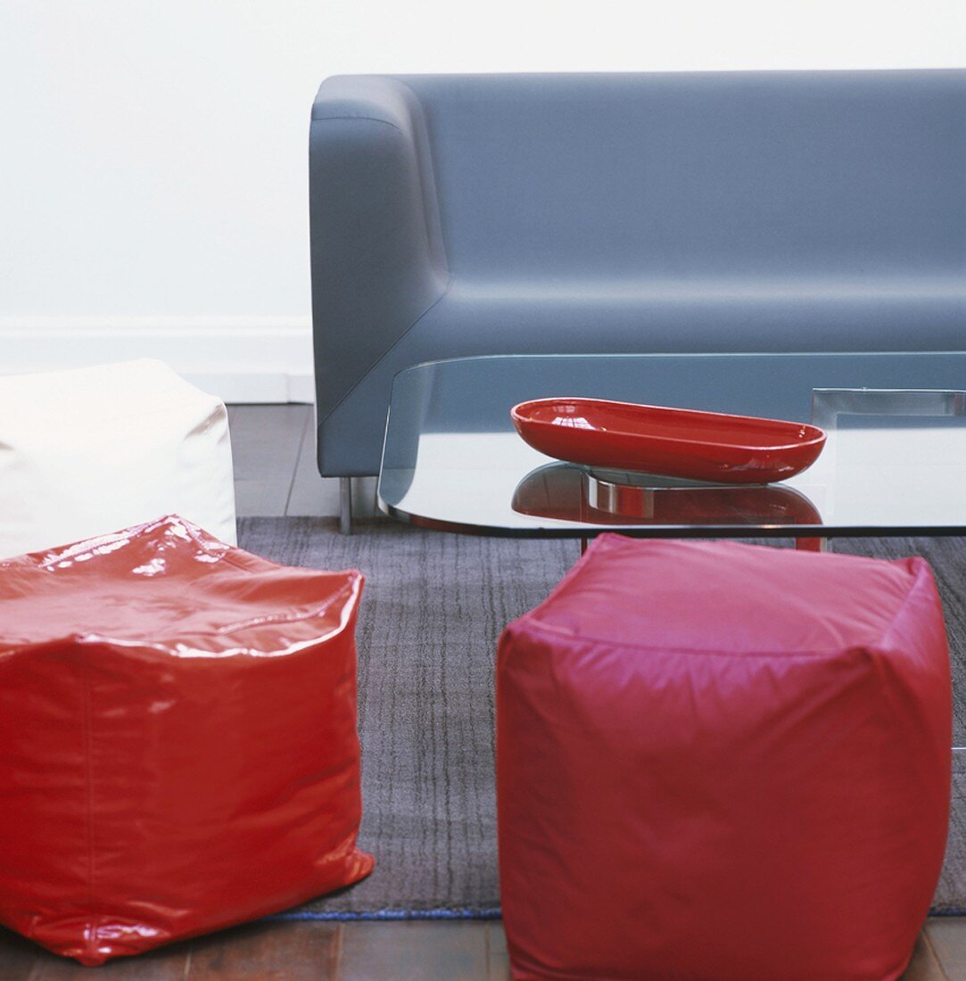 Pouffes and a couch in a living room