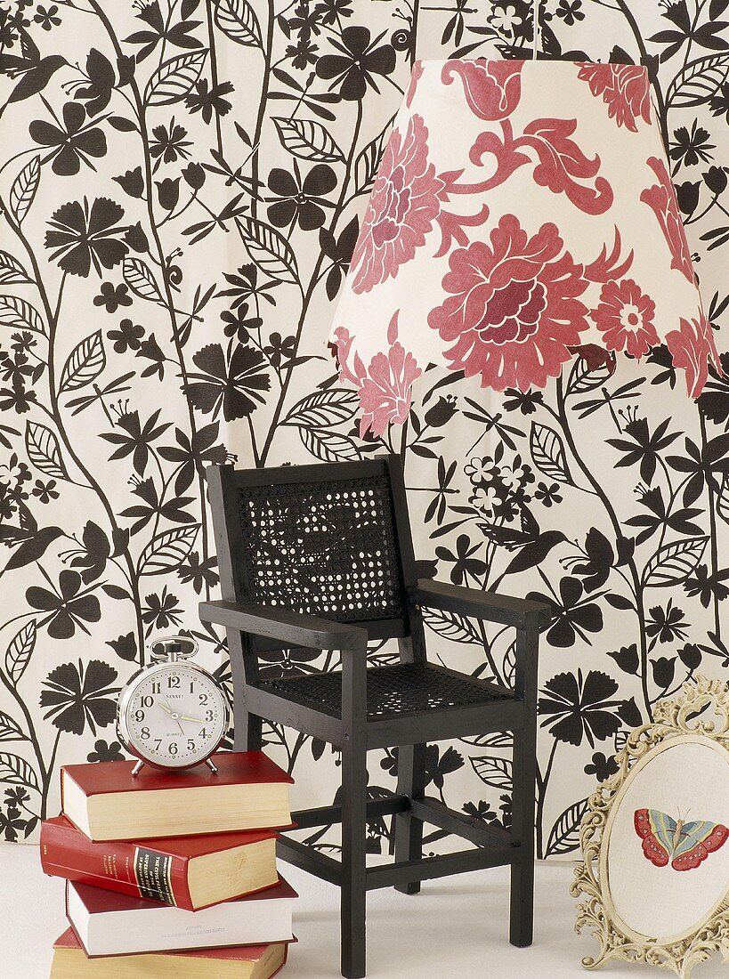 Chair against patterned wallpaper