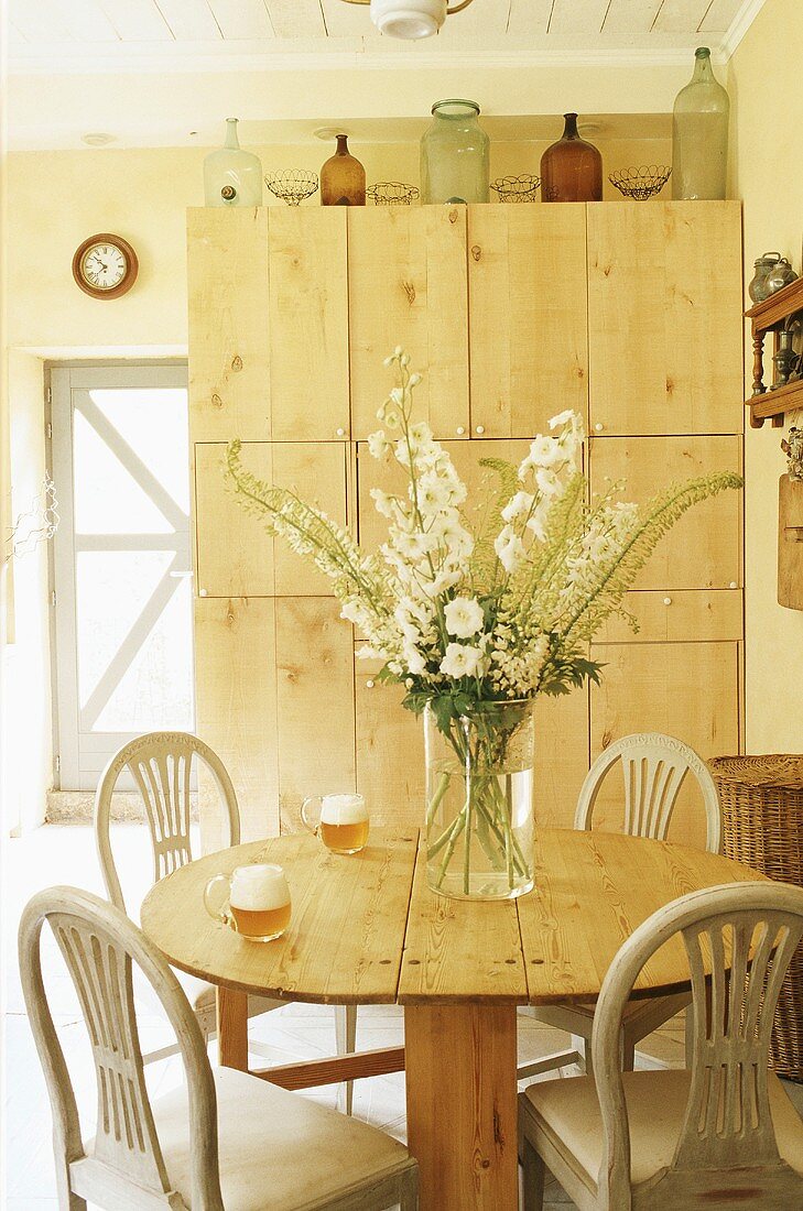 Two glasses of beer on a dining table