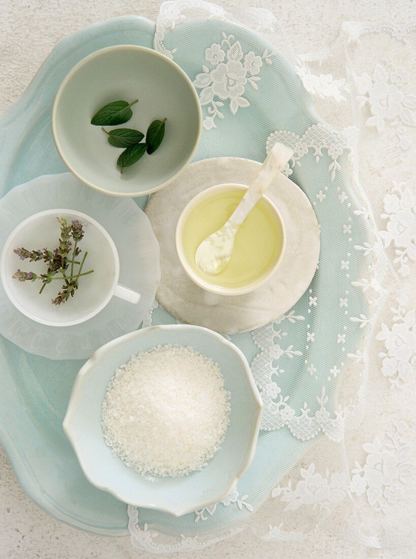 Bowls of salt, herbs and oil