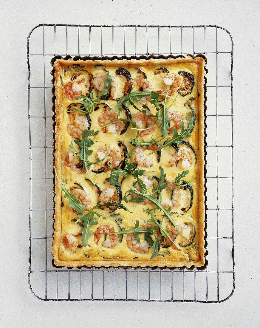 Prawn and courgette quiche with rocket