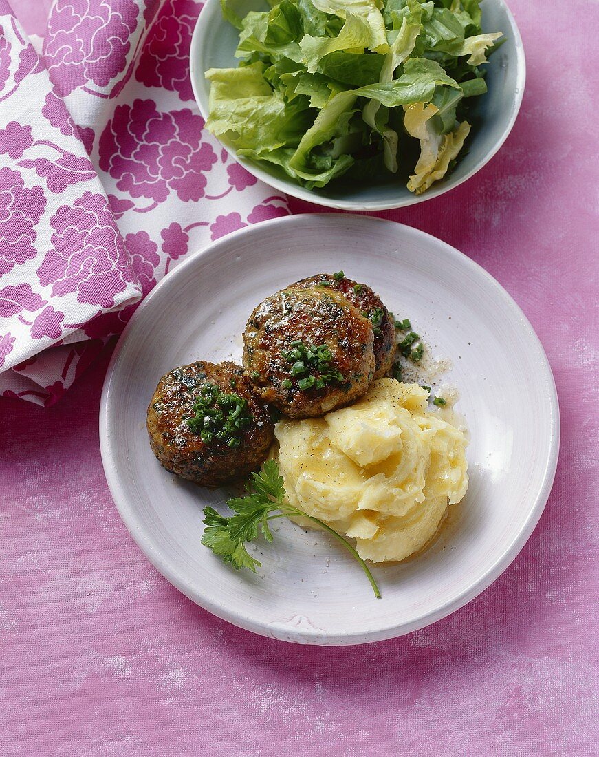 Burgers with herbs and mashed potato