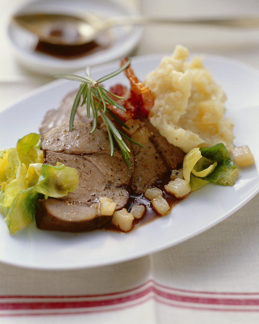 Roast wild boar with mashed potato