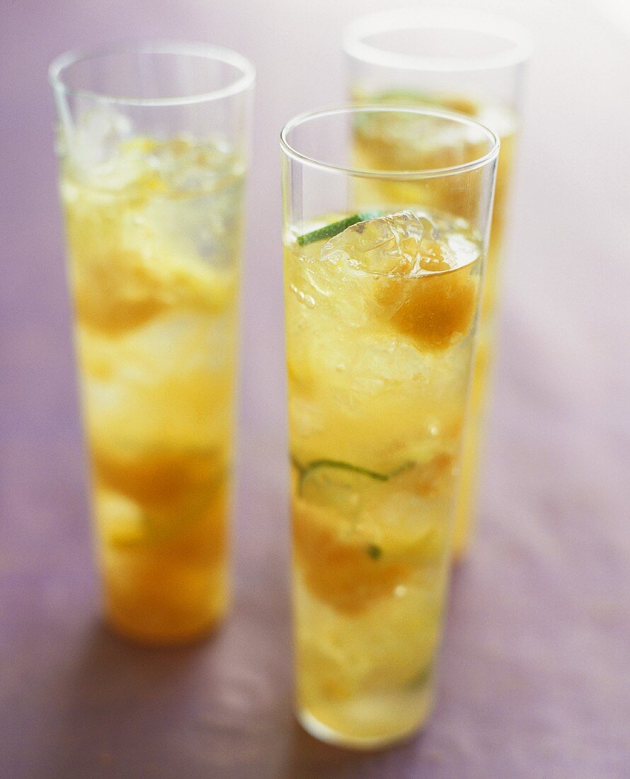 Champagne cocktail with melon and lime