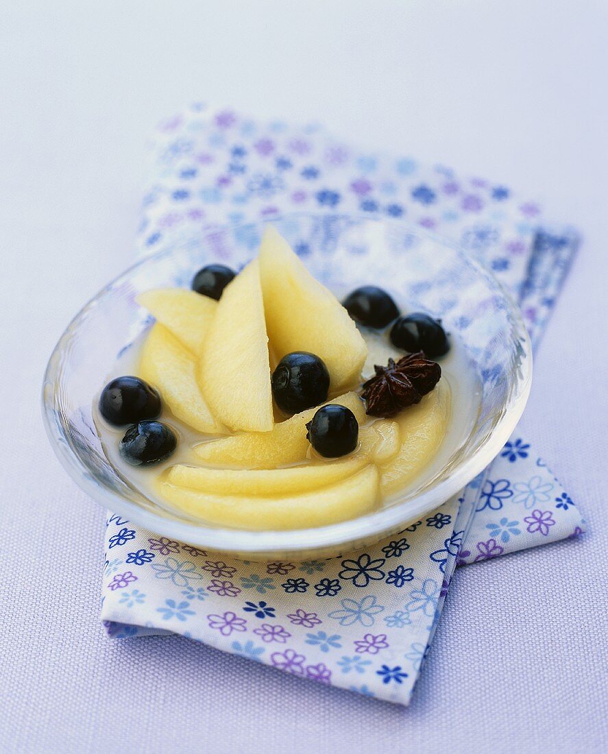 Apple compote with blueberries and star anise