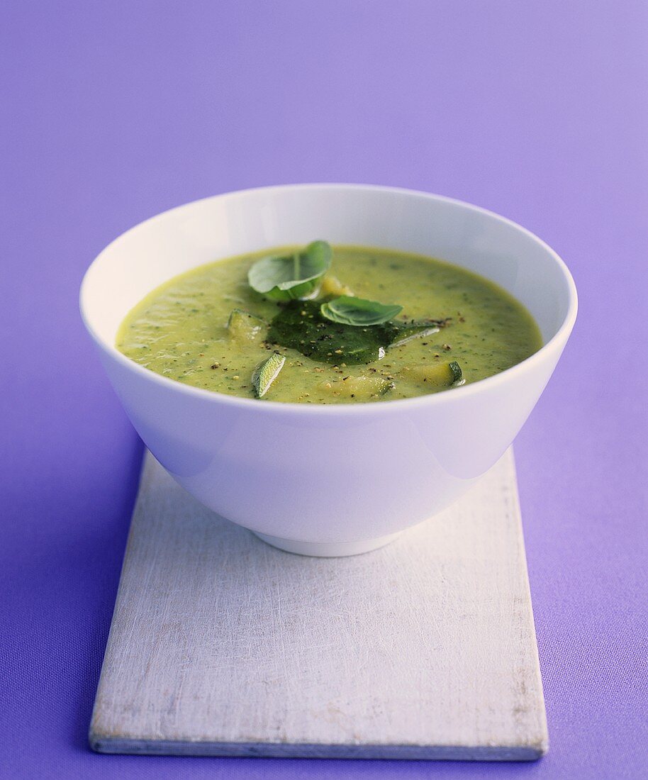 Courgette soup with basil puree