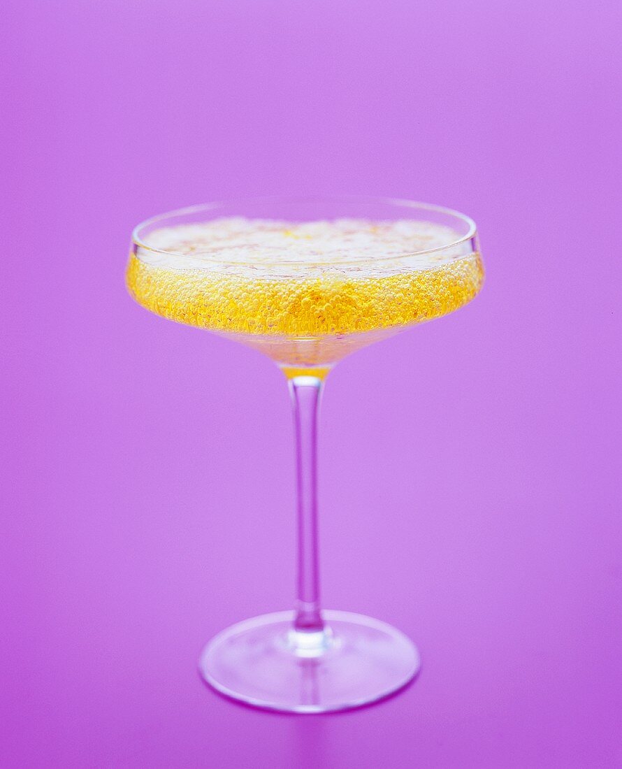 Prosecco and saffron jelly in a champagne coupe