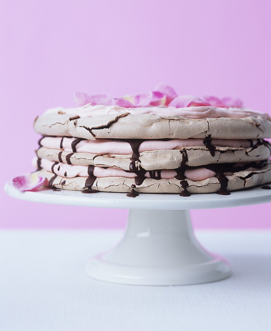 Chocolate meringue cake with rose Chantilly cream