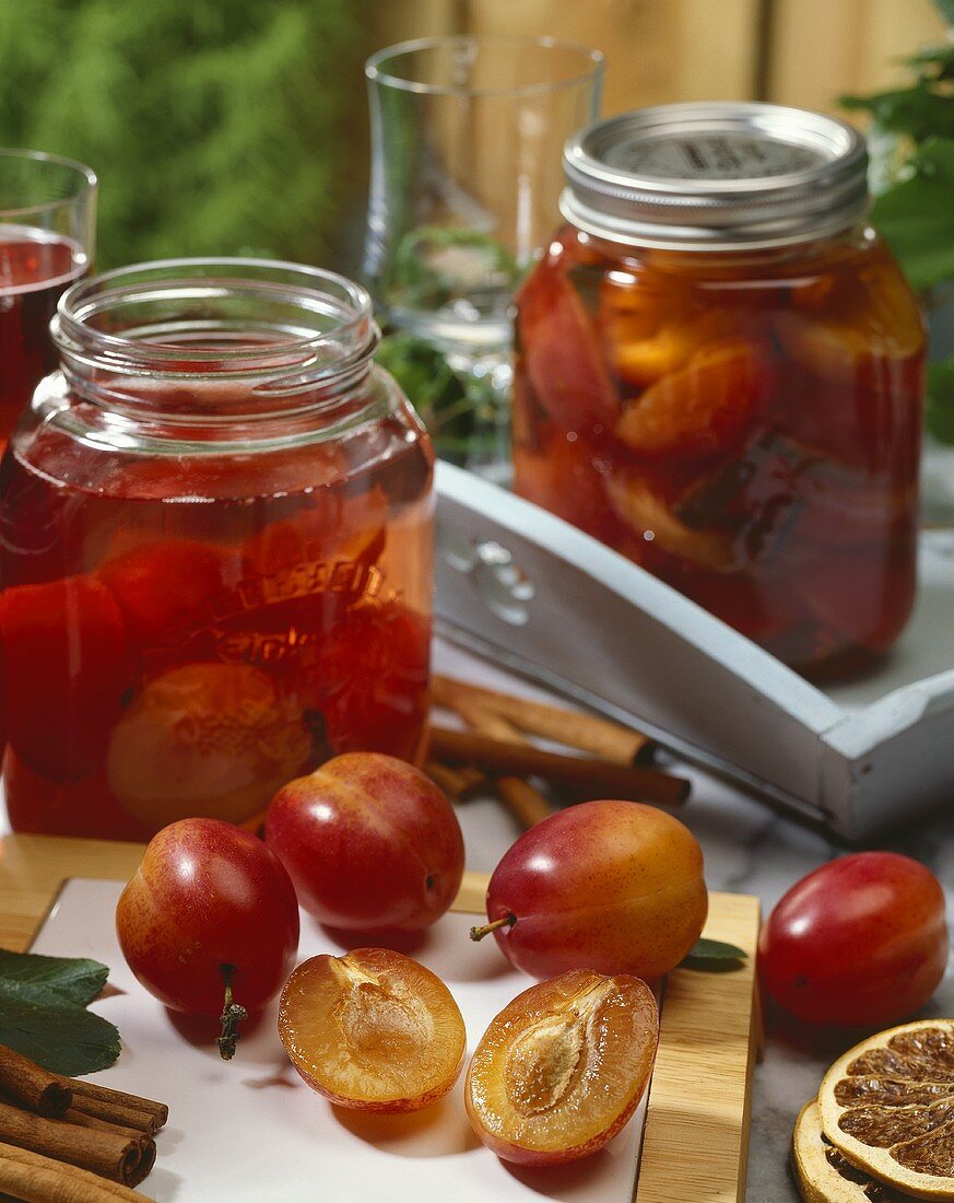Victoria plums in preserving jars