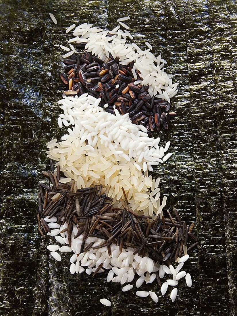 Various types of rice on dried nori sheets