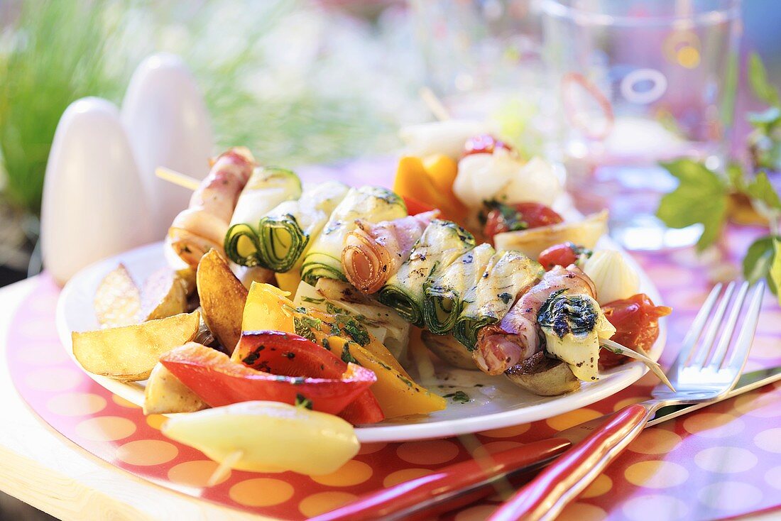 Grilled vegetable and bacon kebabs