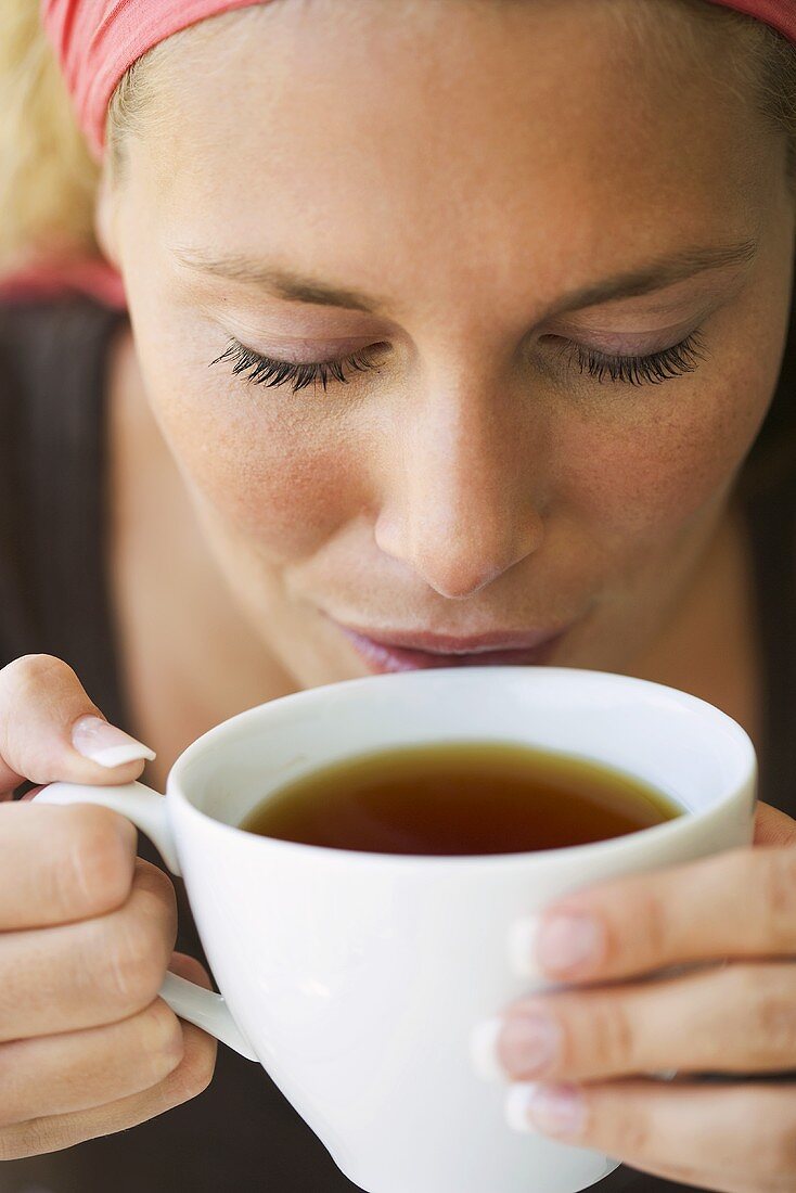 Woman drinking a cup of tea