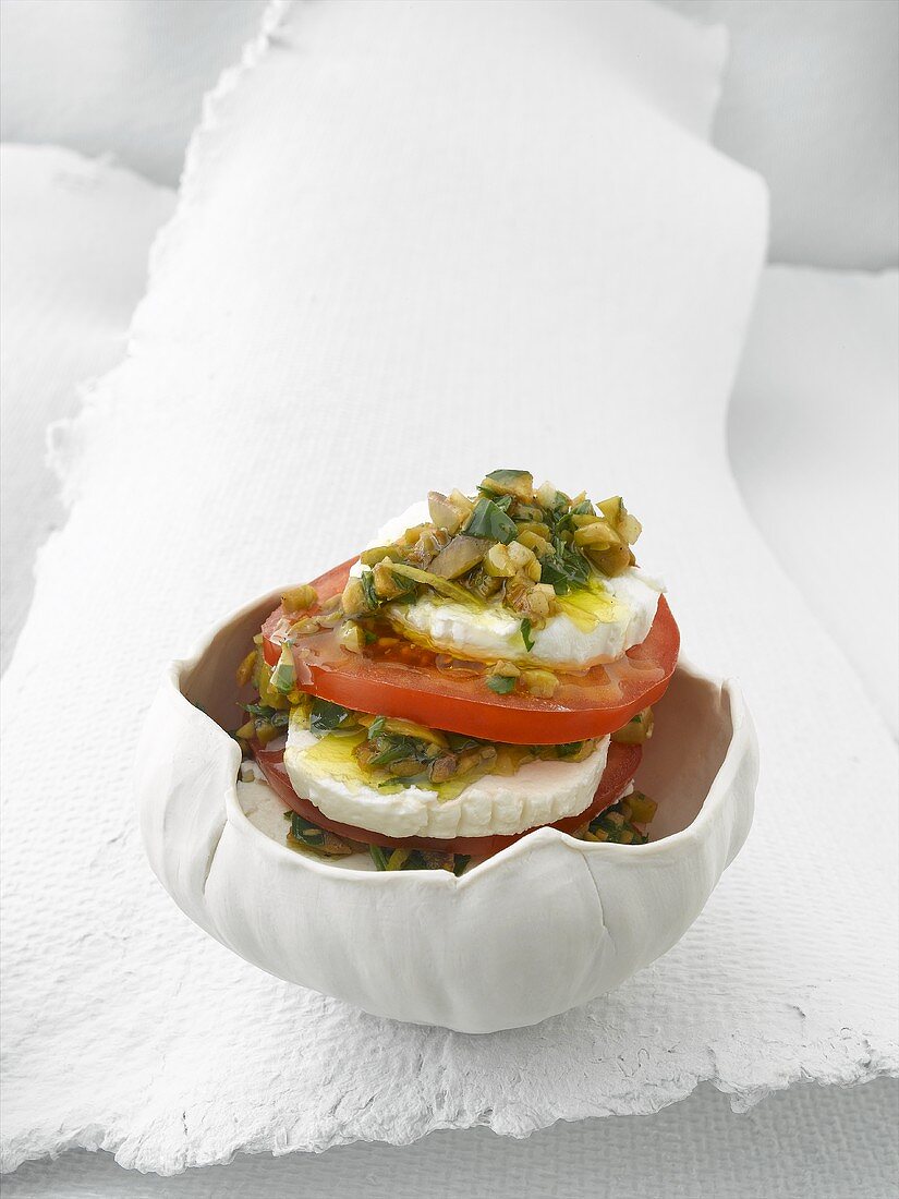Tomato and goat's cheese with tapenade (appetiser)