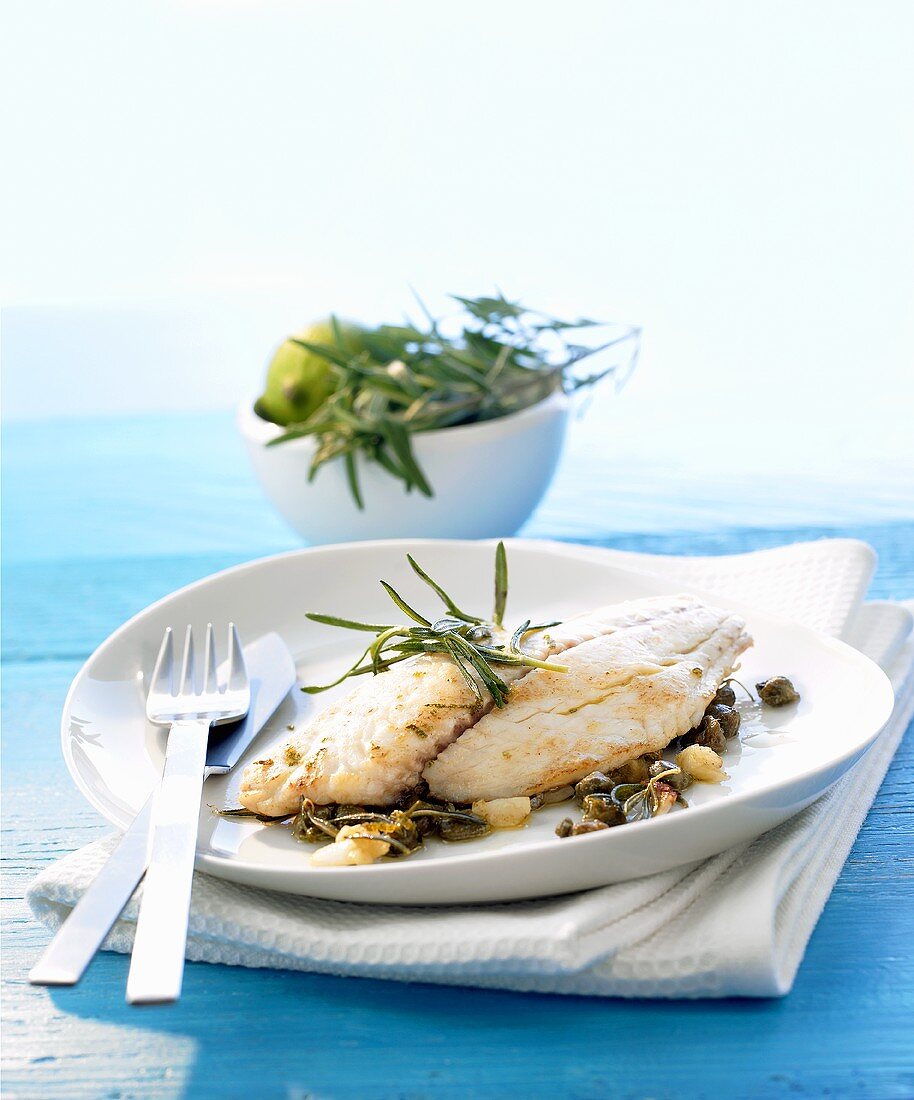 Fish fillet with lime and caper butter and rosemary