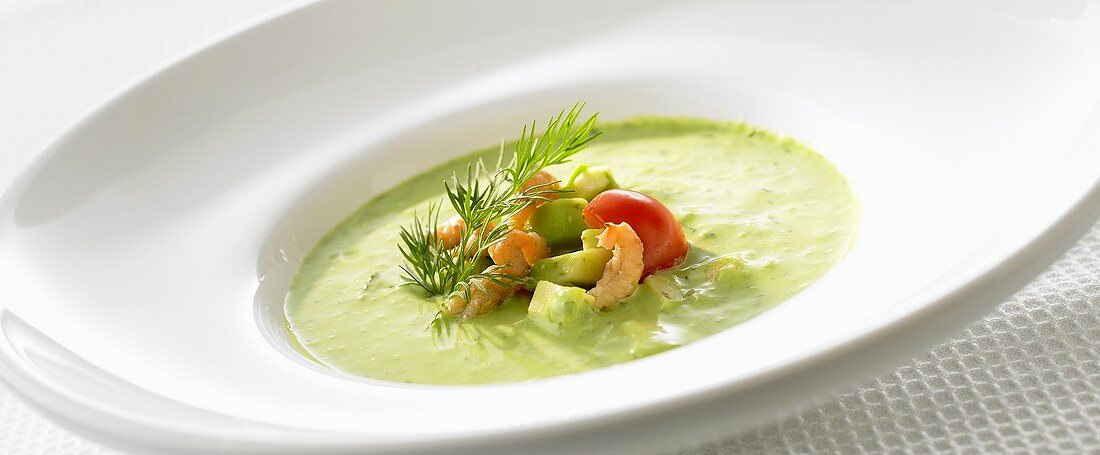 Cold cucumber soup with kefir, avocado and shrimps