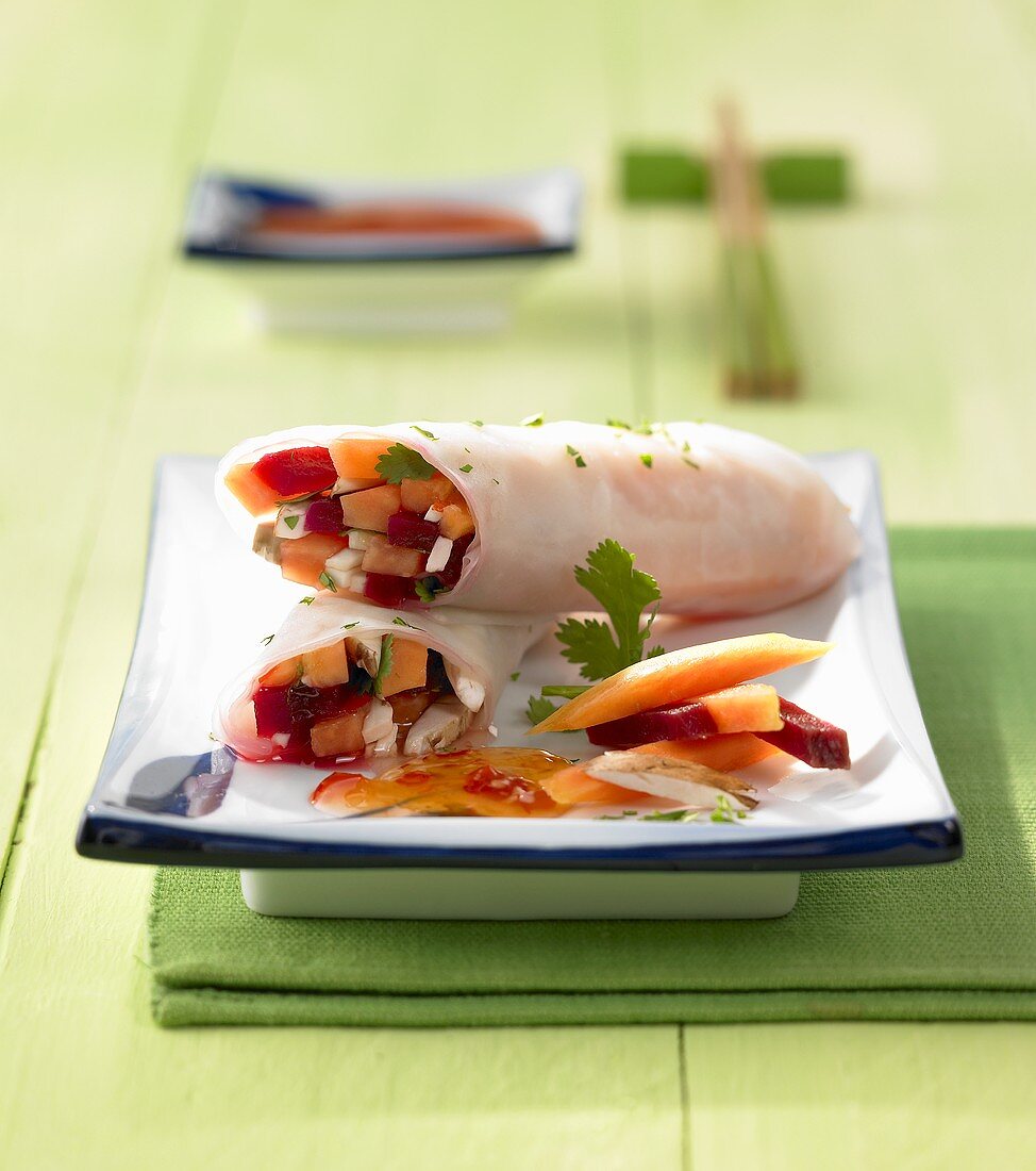 Rice paper rolls with papaya and vegetable filling