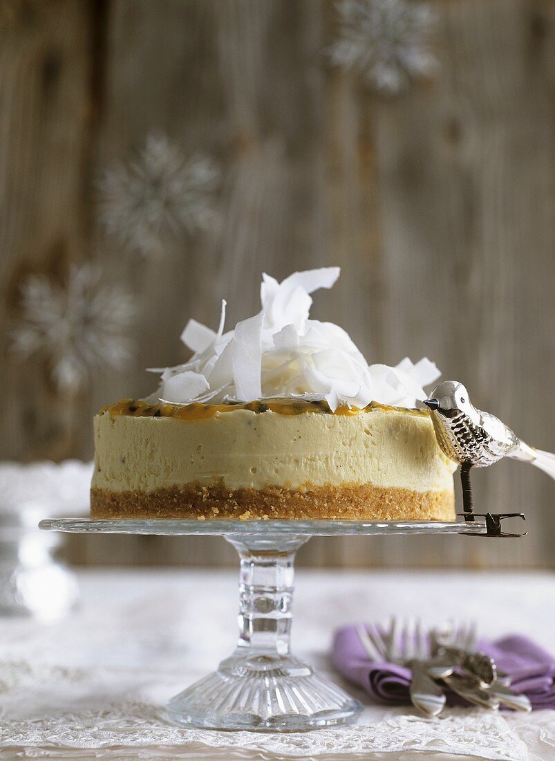 White chocolate cheesecake with coconut & passion fruit sauce