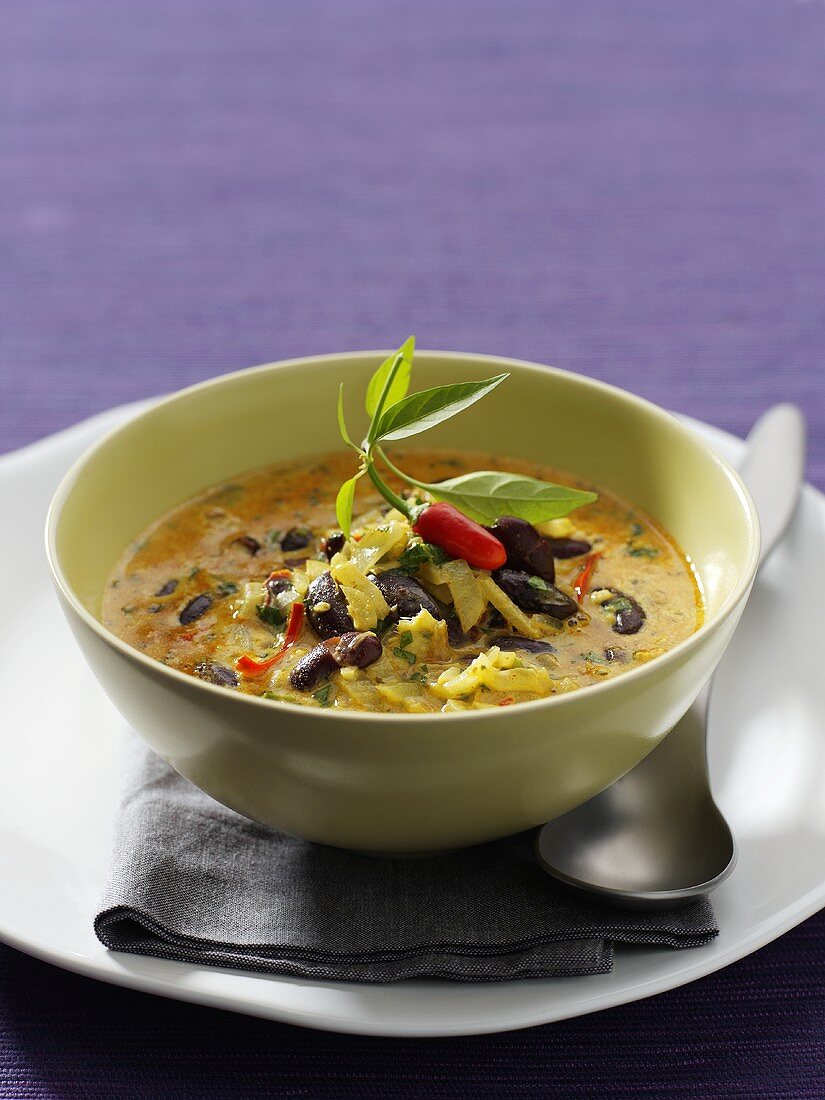Spicy curry coconut soup with red kidney beans