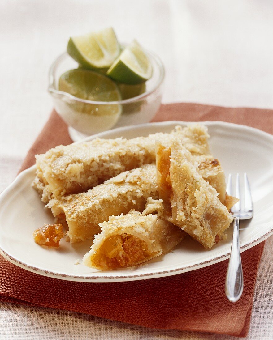 Sweet papaya-filled cannelloni with coconut flakes