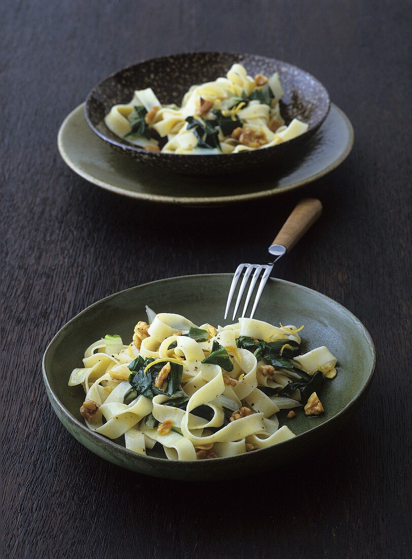 Ribbon pasta with walnuts and spinach