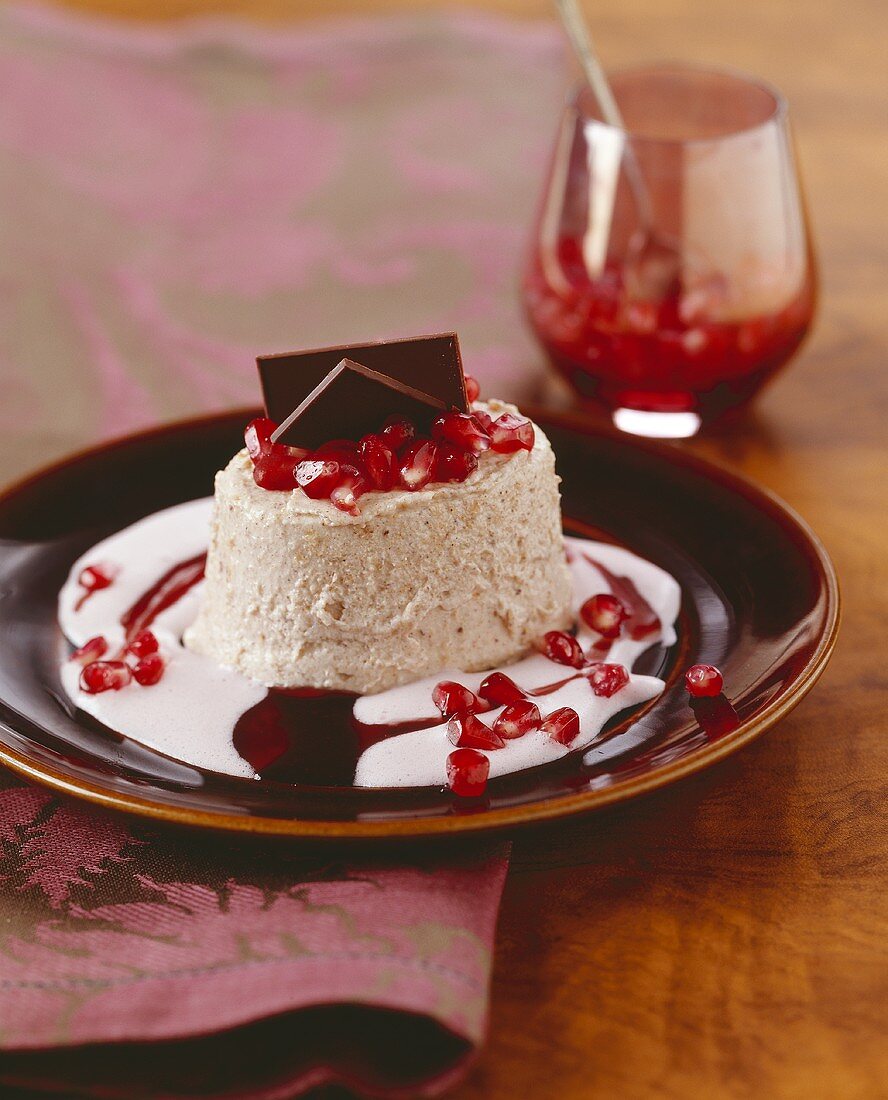 Gingerbread parfait with pomegranate cream sauce